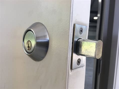 metal bracket for your deadbolt from the outside|installing deadbolt on metal door.